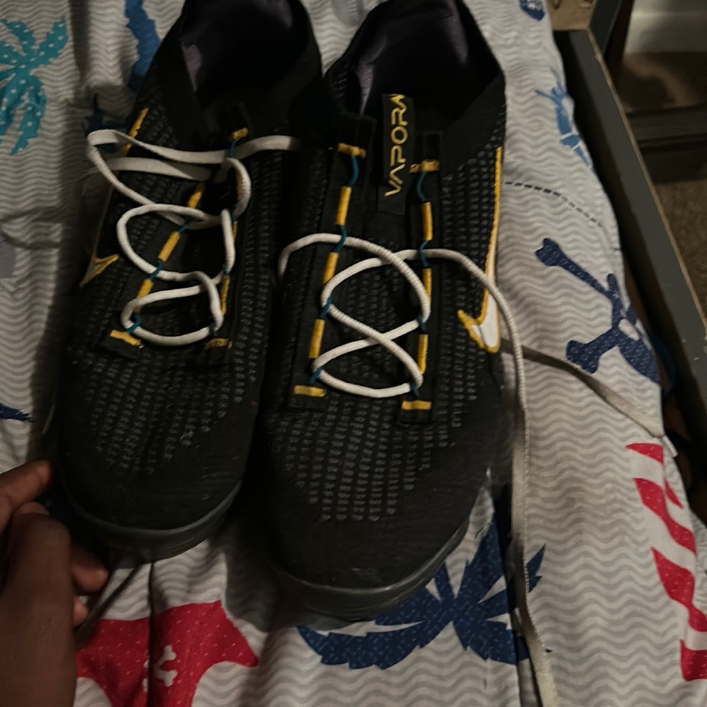 Nikes black and gold